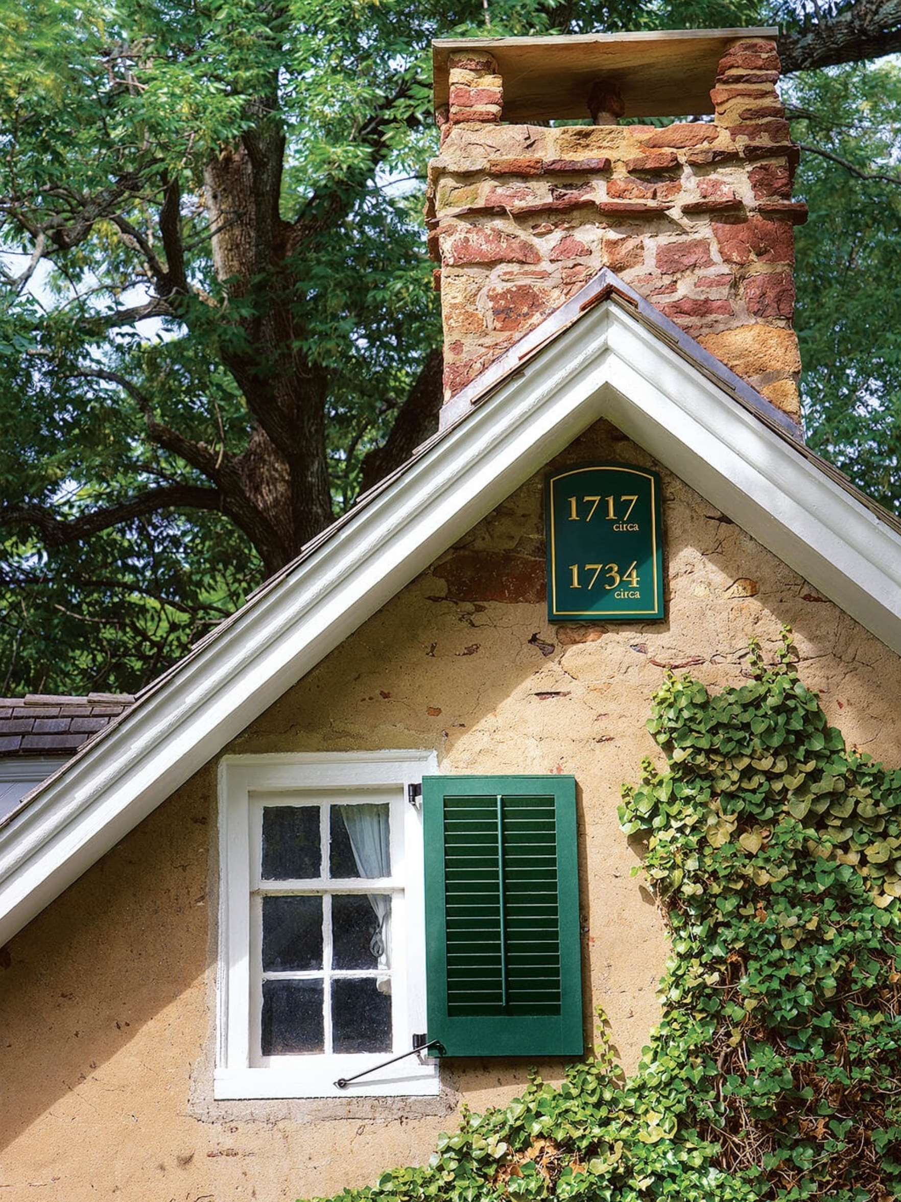 Rustic little window frame with popular shutters